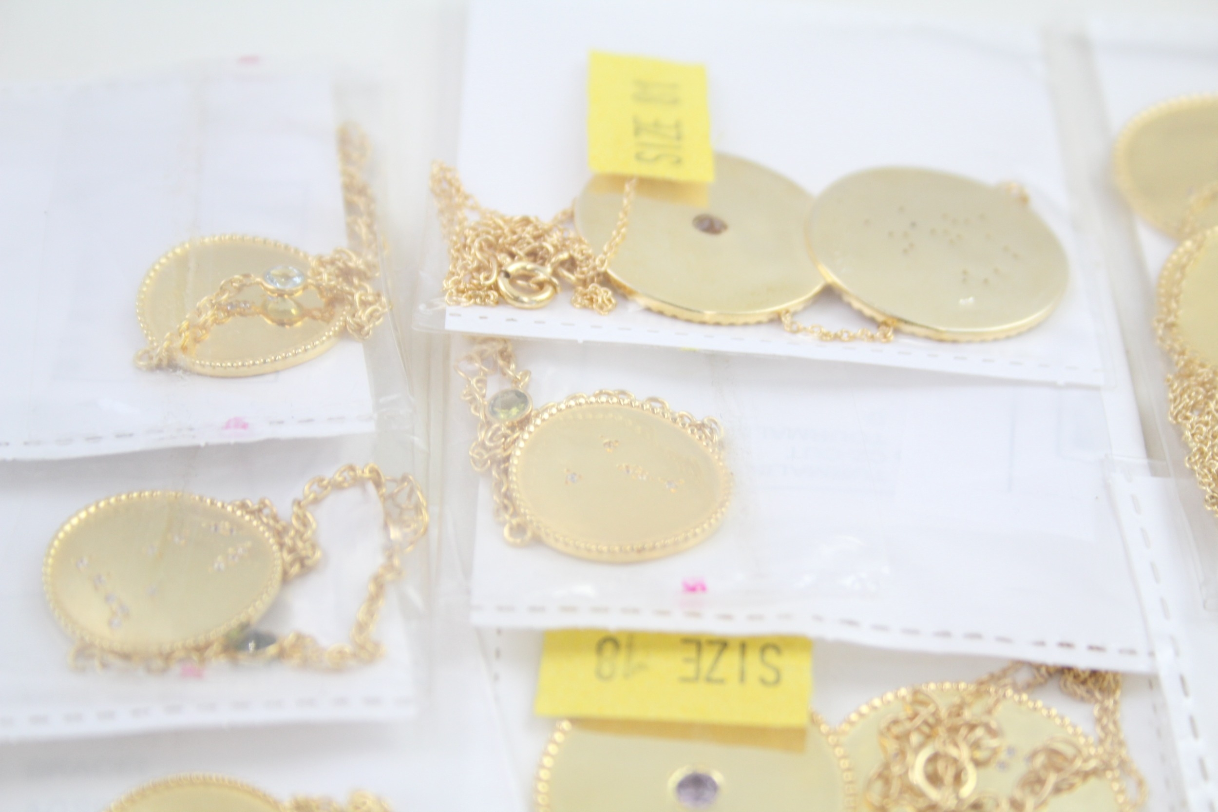 A collection of gold tone silver zodiac necklaces (79g) - Image 6 of 9