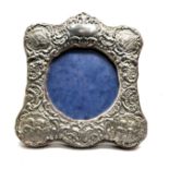 Vintage silver cherub decorated picture frame millenium silver hallmarks measures approx 16cm by