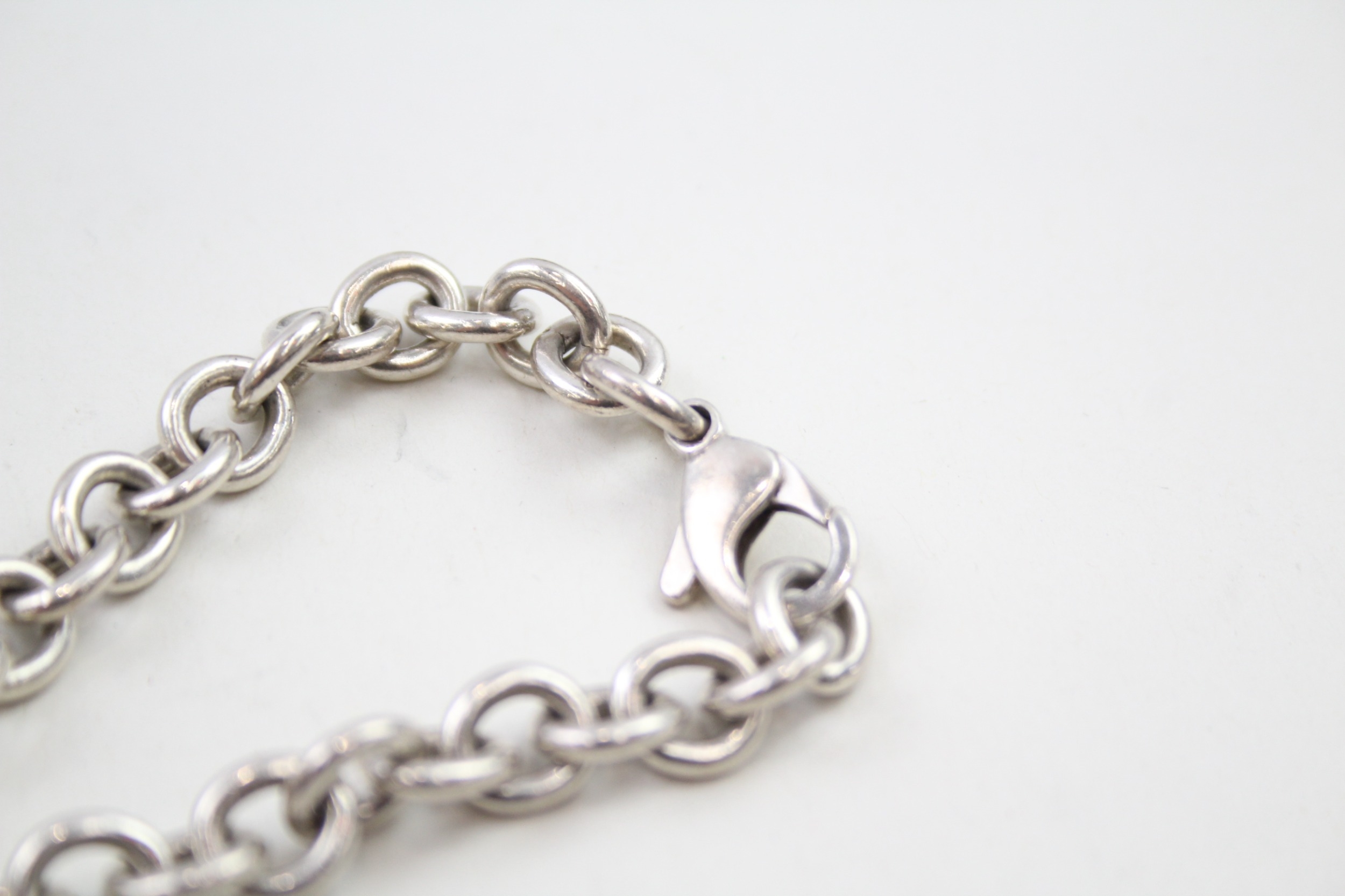 Silver bracelet with heart tag by designer Tiffany & Co (35g) - Image 4 of 7