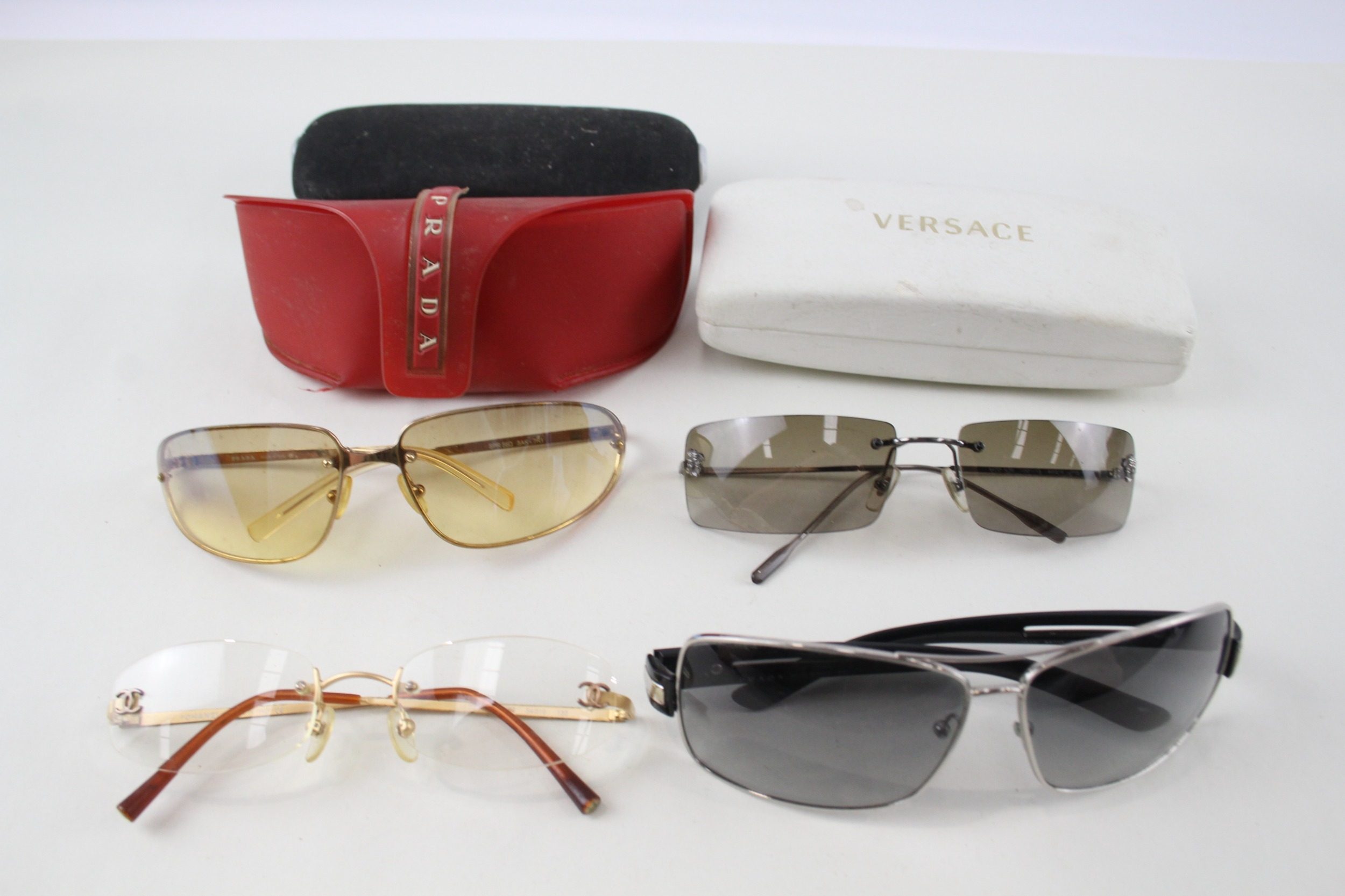 Sunglasses Designer Glasses Inc Chanel, Prada, Versace x 4