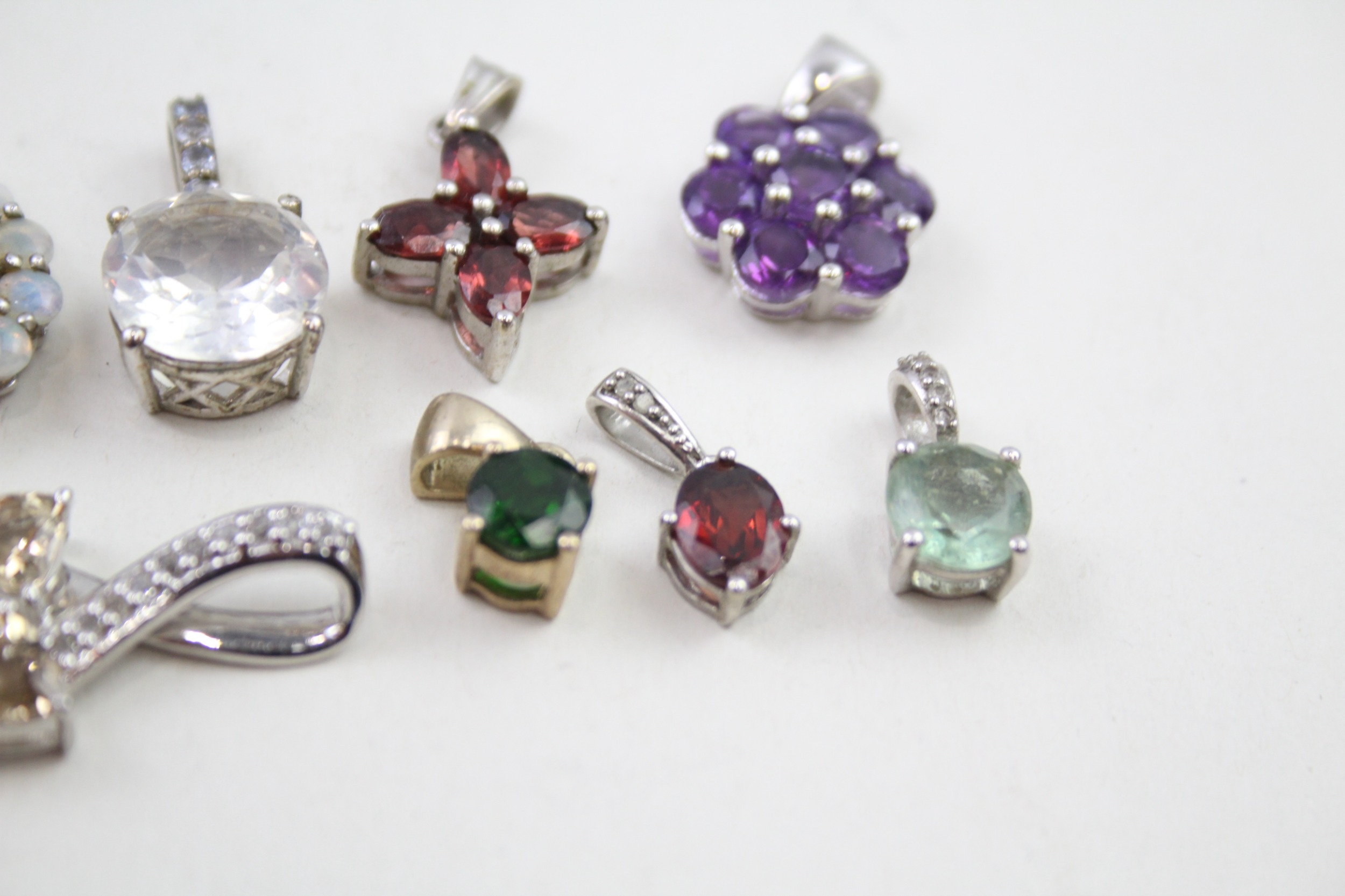 A collection of silver TGGC gemstone pendants including Opal (21g) - Image 5 of 5