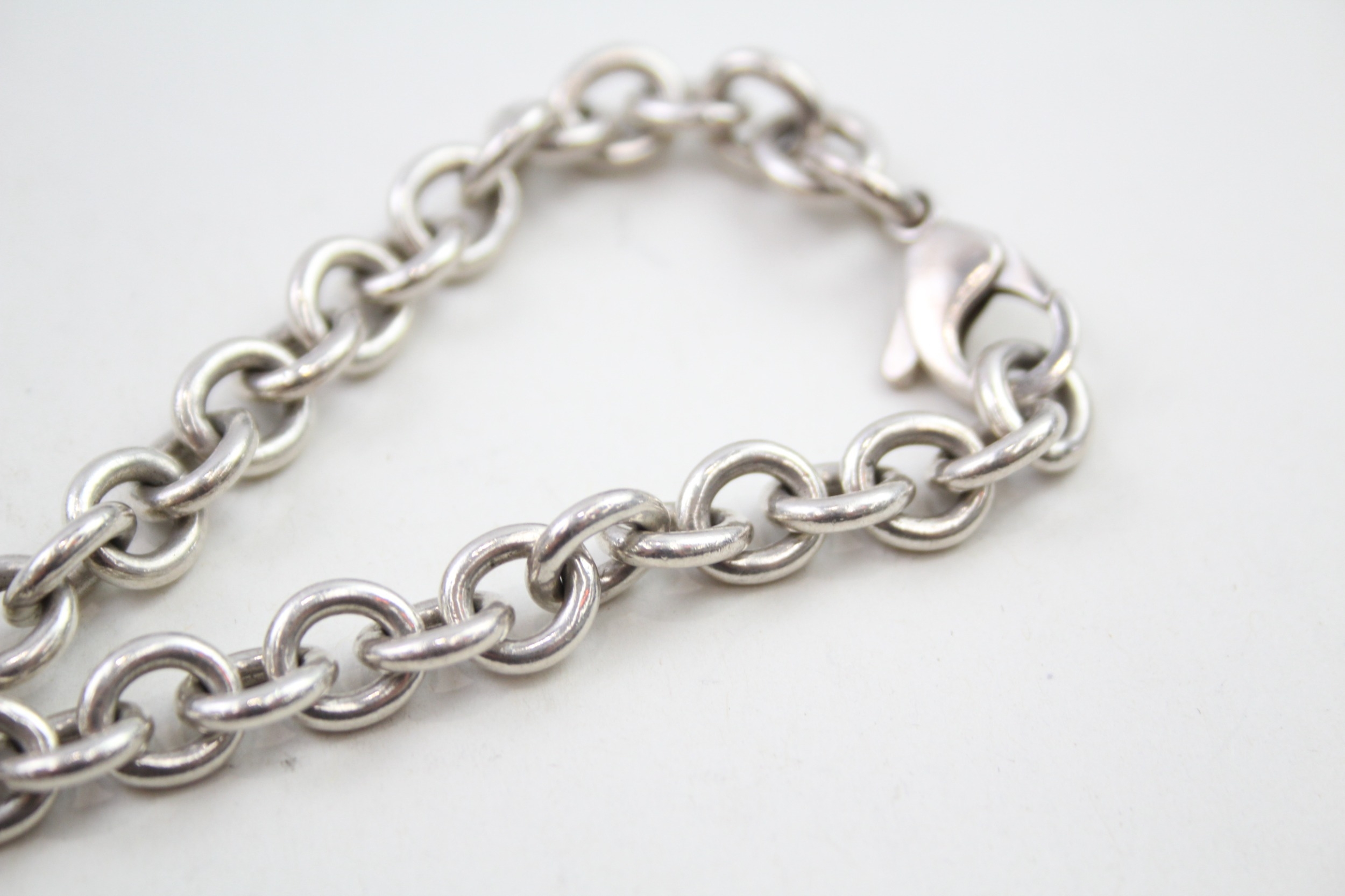 Silver bracelet with heart tag by designer Tiffany & Co (35g) - Image 3 of 7