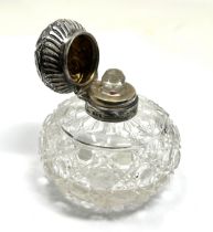 Antique silver & cut glass perfume bottle measures approx height 9cm by 9cm dia London silver