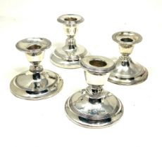 4 silver squat candle sticks non matching