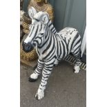 Resin baby zebra figure measures approximately 28 inches tall, 24 inches long