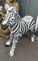 Resin baby zebra figure measures approximately 28 inches tall, 24 inches long