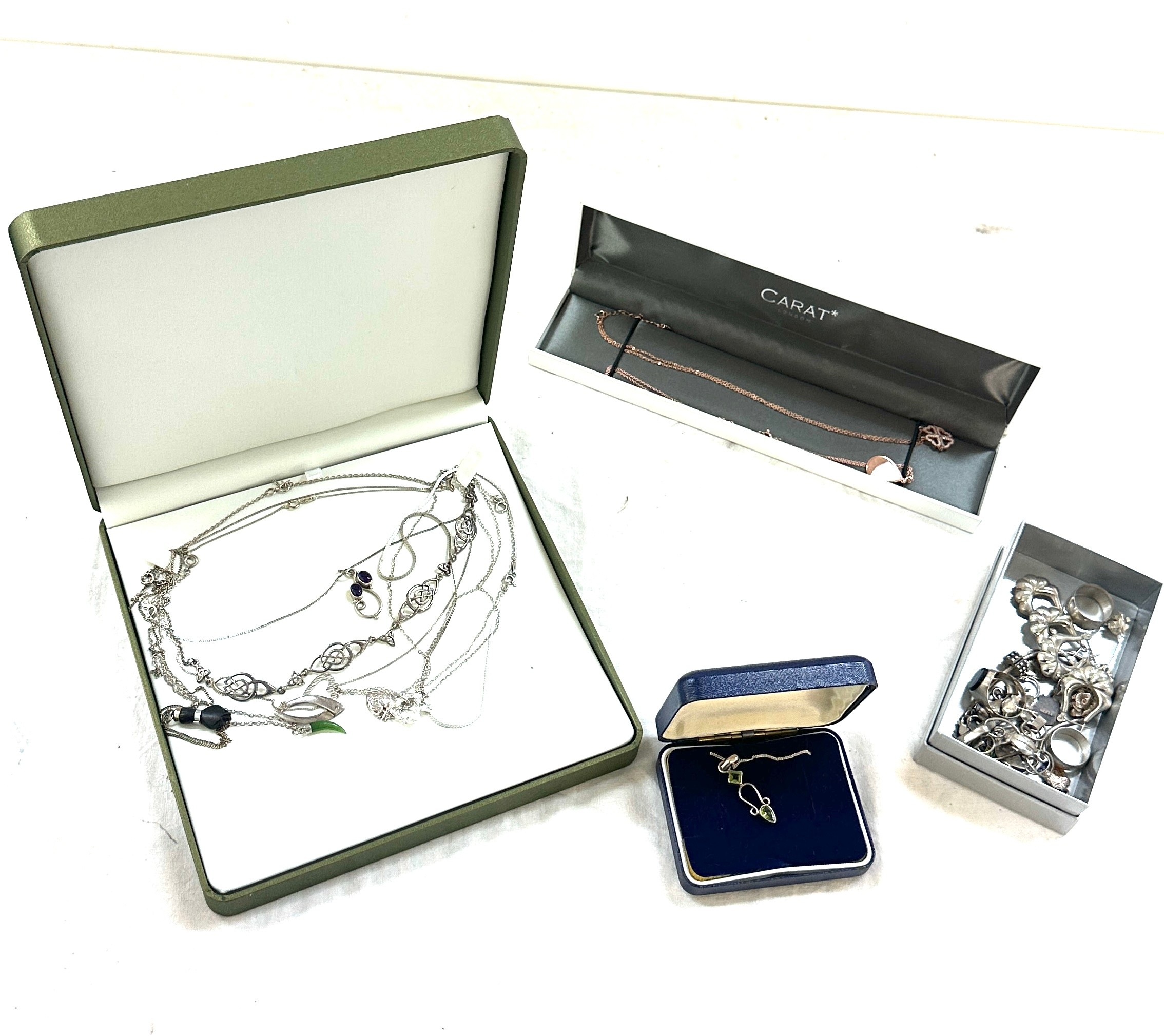 Four boxes of silver jewellery to include necklaces etc