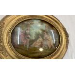 Oval gilt framed painting measures approx 13.5 wide by 11 long