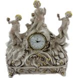 Porcelain mantle clock, depicting cherubs and elephants, untested, approximate measurements: