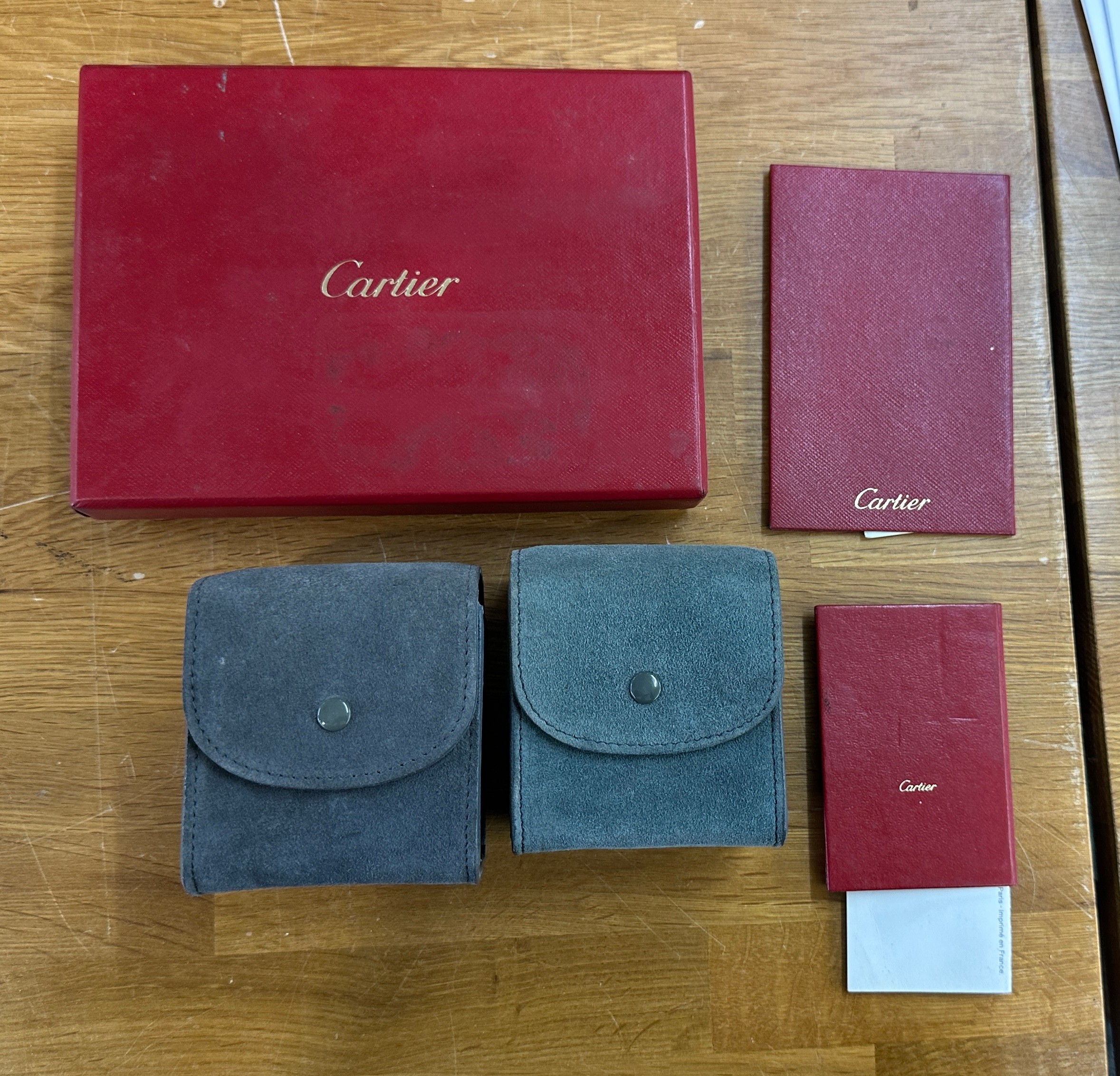 Selection of Cartier jewellery boxes/ paper work etc