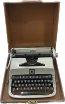 Vintage cased Golden touch Underwood type writer