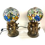 Cherub base lamps, with sphere glass shades, working order, overall height 17 inches