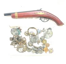 Selection of collectables includes pocket knives, medals, plastic gun etc