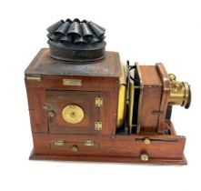 Antique mahogany magic lantern by Archer and sons Liverpool length 45cm, complete with lens