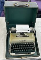 Cased Remington travel riter type writer