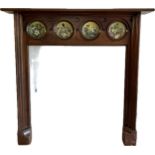 Antique mahogany fire place with four inside Christopher Dresser Linthorpe plates circa 1880