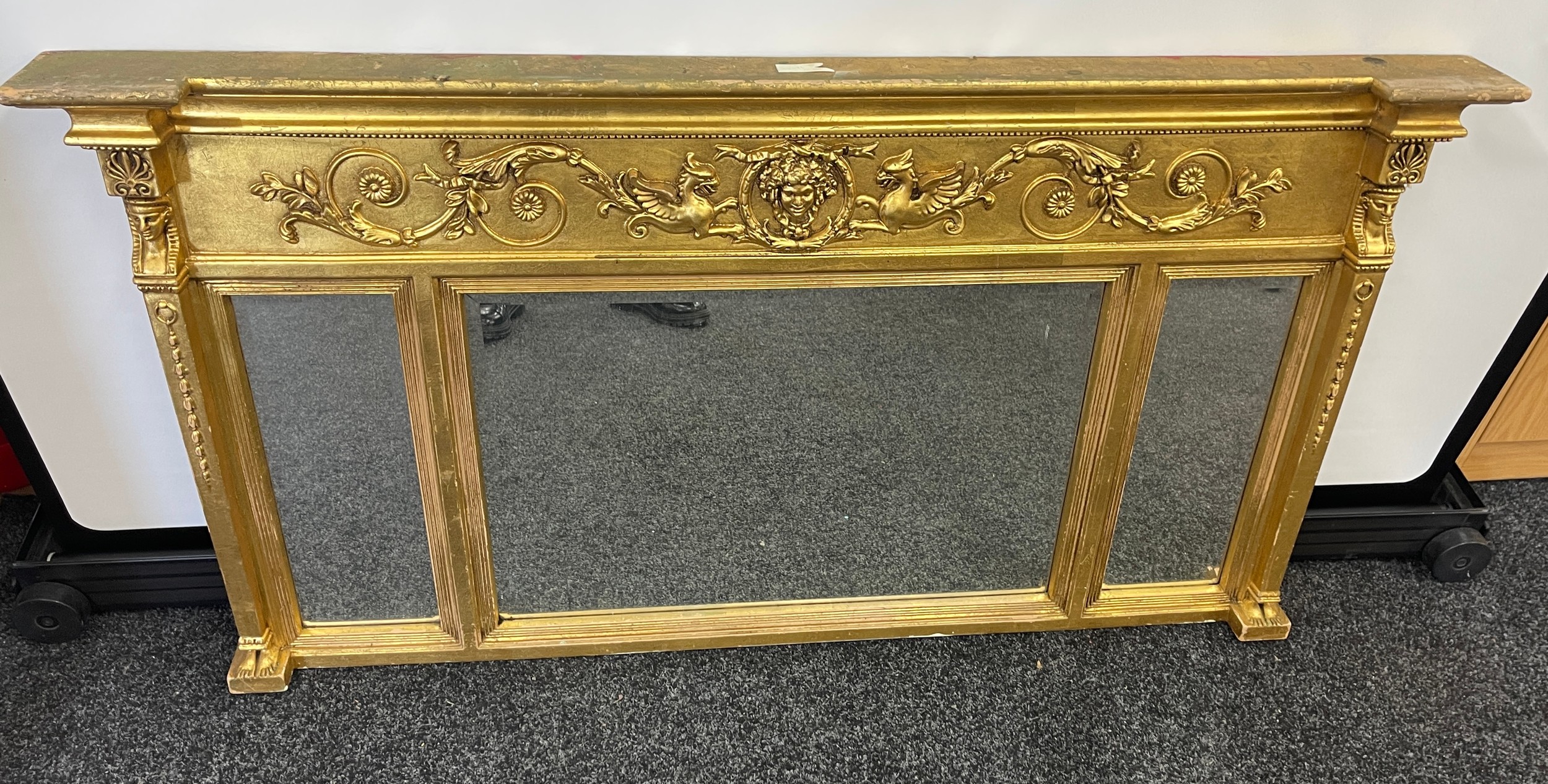 Gilt framed ornate mantle mirror, Height 30 inches, Width 55 inches