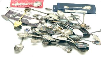 Assortment of silver plated souvenir spoons
