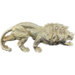 Resin ornamental champagne coloured lion, approximate measurements 21 x 8 inches