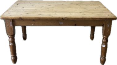Pine table and 2 chairs, approximate measurements of table Height 30.5 inches,Width 36 inches Length