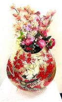 Large decorative oriental design vase with flowers, height of vase 23 inches, width 25 inches