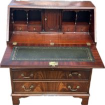 Flamed mahogany bureau, approximate measurements: Height 37 inches, Width 29.5 inches, Deoth 17