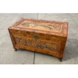 Carved oriental blanket box measures approx 23 inches tall, 40 wide and 21 deep