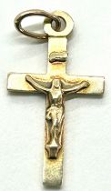 9ct gold religious cross pendant , approximate weight 0.8g