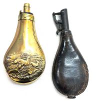 Antique brass powder flask and a leather shot flask