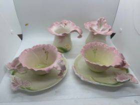 Tea set depicting pink flowers