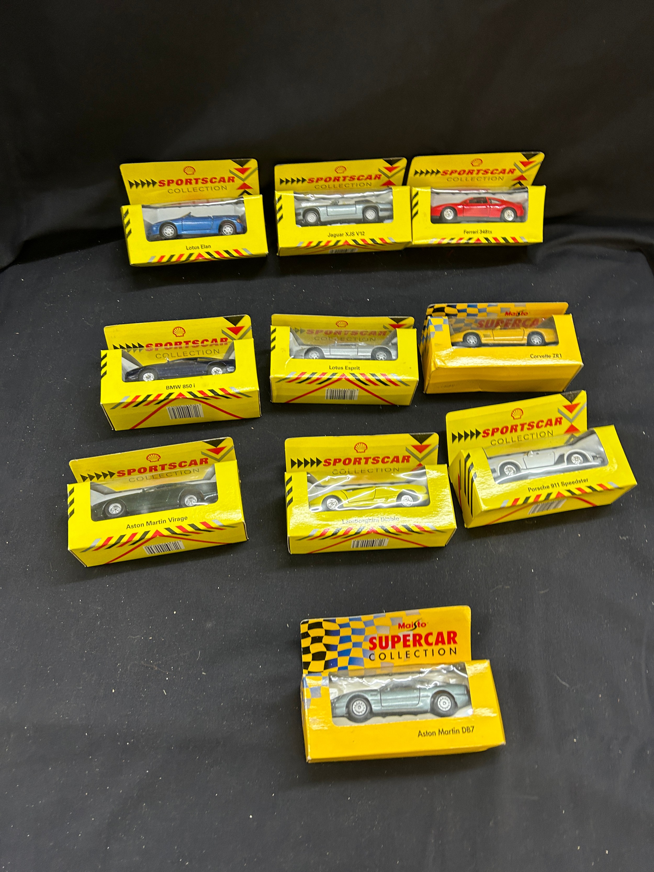 Selection of boxed Maisto cars includes jaguar etc