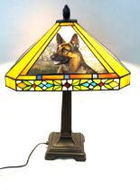 Metal, glass shade table lamp, shade depicts various images of alsatians, working order, approximate