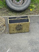 Brass magazine box and a small metal stool