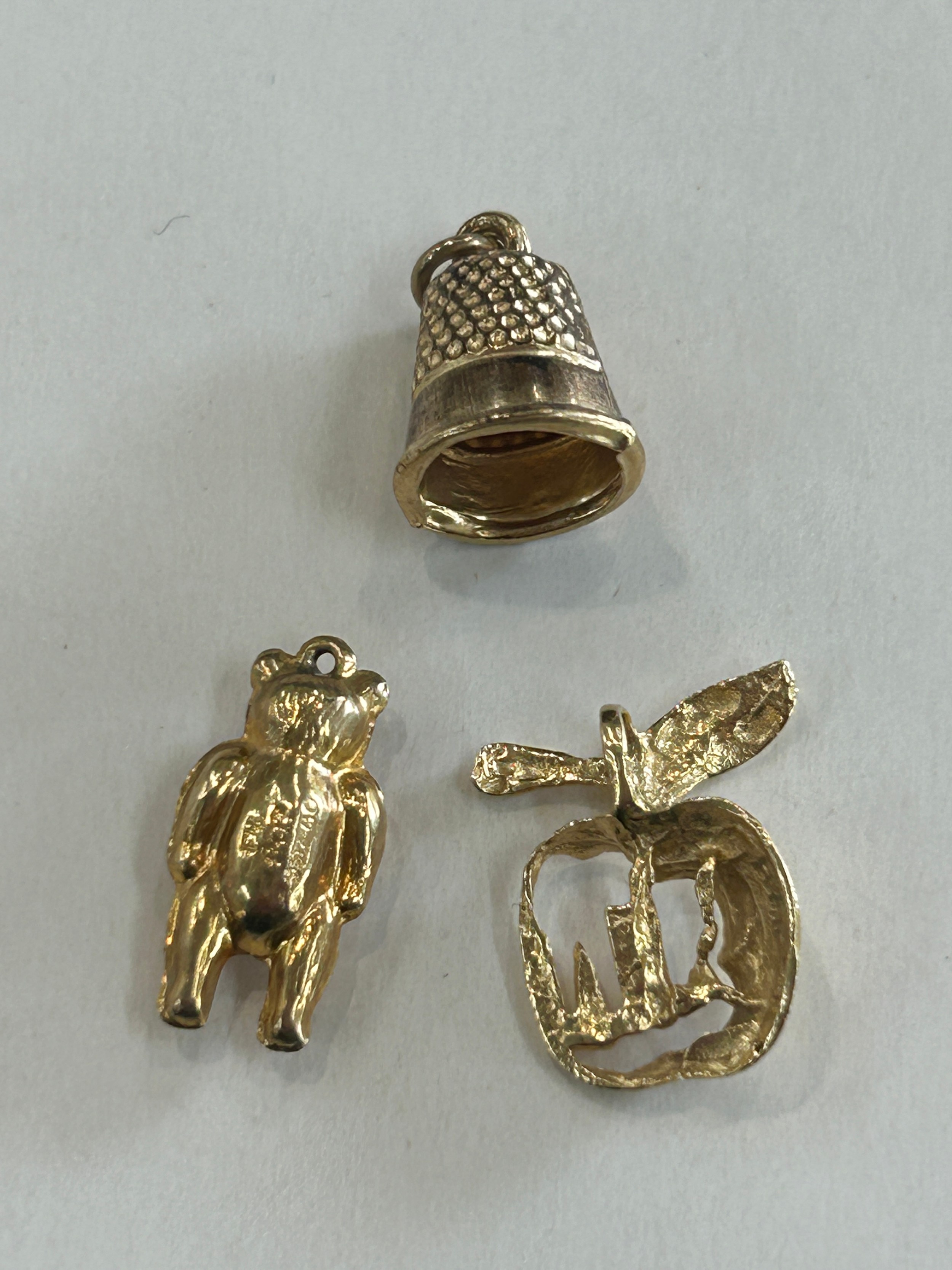 2 9ct gold charms ( teddy and a bell), 14ct gold New York apple charm - Image 2 of 2