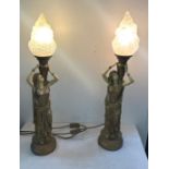 Pair gold lady with flame shaped table lamps, working order, overall height 28 inches