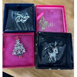 Selection of four boxed Butler and Wilson brooches