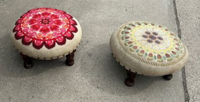 Two upholstered round foot stools