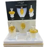 Boxed Lalique Les Flacons Miniatures to include Sirenes 2001, Sylphide 2000, Les Elfes 2002