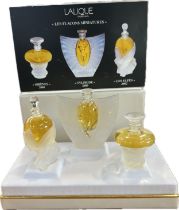 Boxed Lalique Les Flacons Miniatures to include Sirenes 2001, Sylphide 2000, Les Elfes 2002