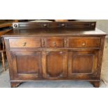 Solid oak antique 3 door, 3 drawer sideboard, approximate measurements: 40 inches tall 59 inches