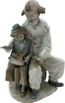 Nao figure depicting Clown and boy, approximate height: 11 inches