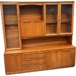 Teak sakol wall unit measures approx 70 inches long, 20 deep and 67 tall