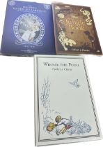 Three collectors coin sets includes The jungle Book, Winnie the Pooh and the queens coronation