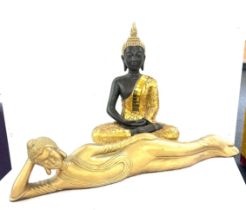 2 decorative buddhas, gold detailing, longest measures approximately 31 inches