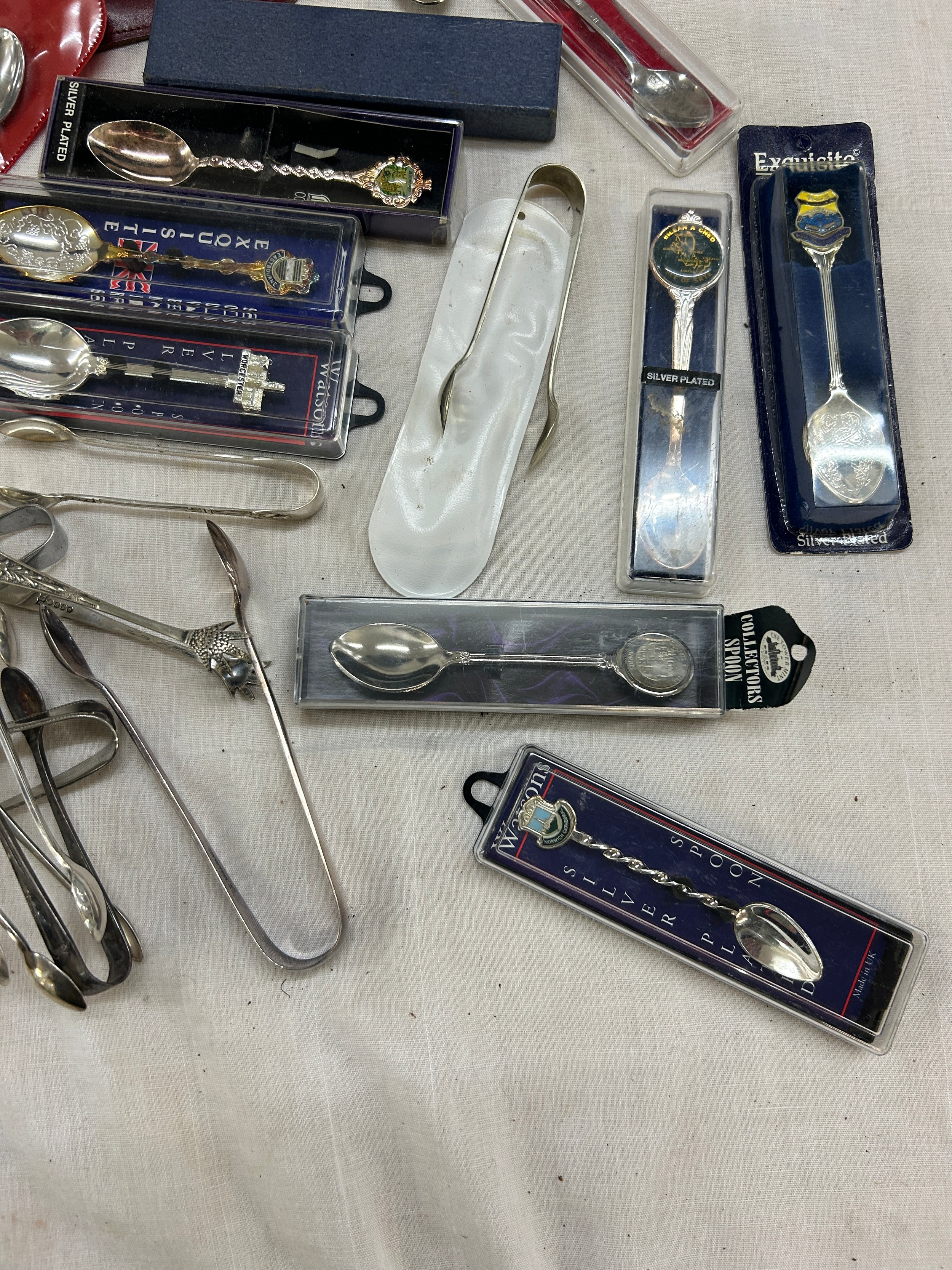 Selection of assorted souvenir spoons and EPNS sugar tongs - Image 5 of 5