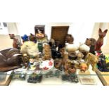 Selection of wooden cat ornaments, various animal pot pieces, and clowns