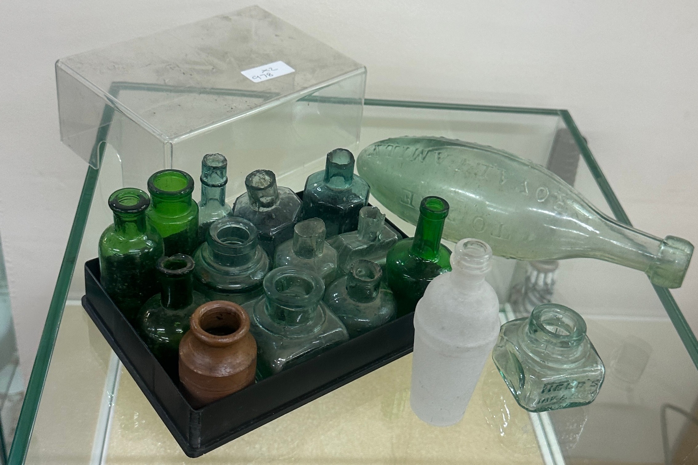 Selection of vintage glass bottles / pots etc