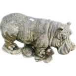 Resin hippo garden figure measures approximately 16 inches tall