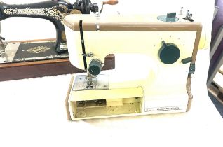 Two vintage sewing machines one Singer one other- both untested