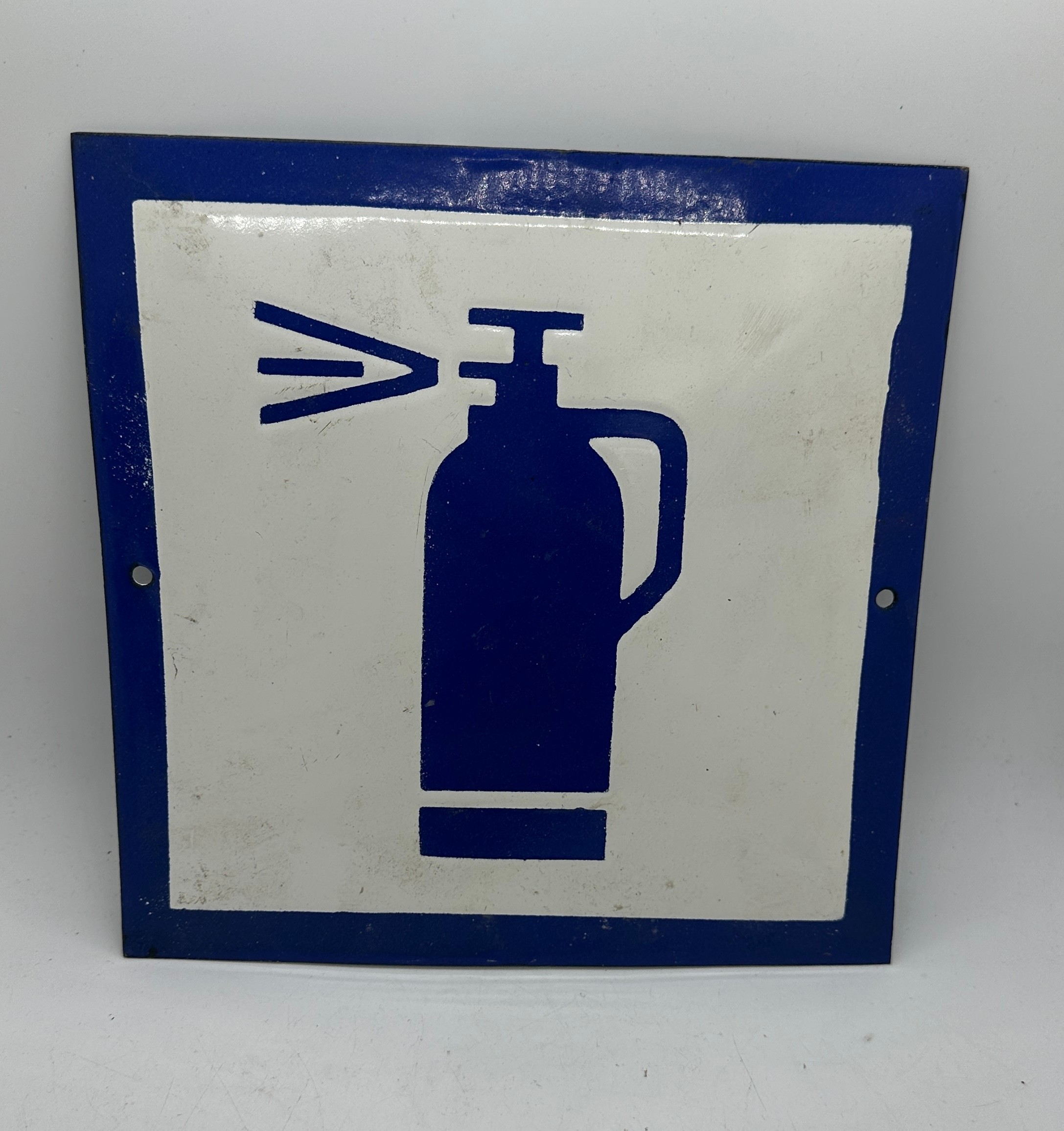 Enamel fire extinguisher sign measures approx 9.5 long by 9.5 wide